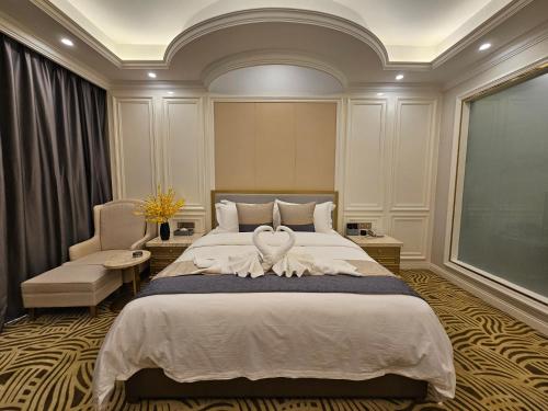 Katil atau katil-katil dalam bilik di Swan Lake Hotel