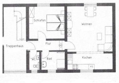 a black and white floor plan of a house at Hof Helmenhube 2 in Gammelsbach