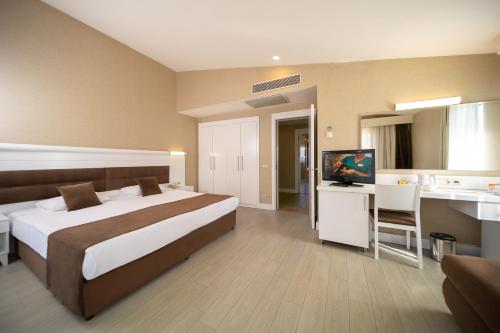 Postel nebo postele na pokoji v ubytování Sueno Hotels Beach Side