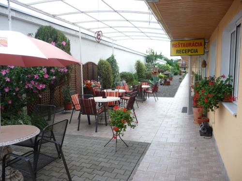 A restaurant or other place to eat at Apartmany Tereza