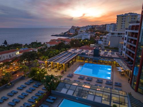 an overhead view of a building with a swimming pool at The Views Monumental in Funchal