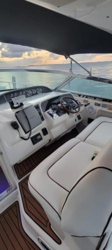 a view of the cockpit of a luxury yacht at Billionaire Yach Resort - Muelle Marina Puerto Cancun in Cancún