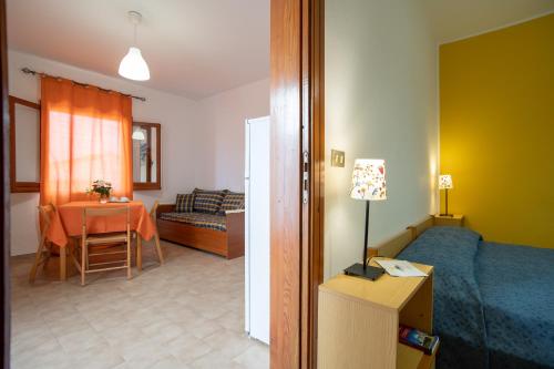 Posteľ alebo postele v izbe v ubytovaní Testa di Monaco - Basic Beach Accommodations