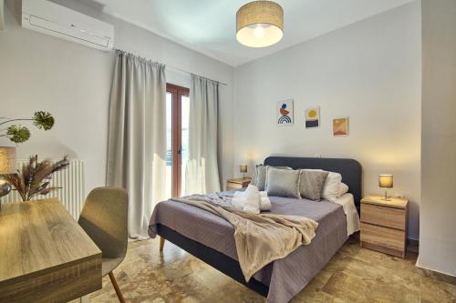 Postel nebo postele na pokoji v ubytování Maria House