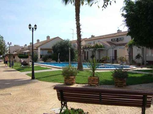 Bazén v ubytování Aldeas De Aguamarina Phase I Ground Floor Apartment nebo v jeho okolí