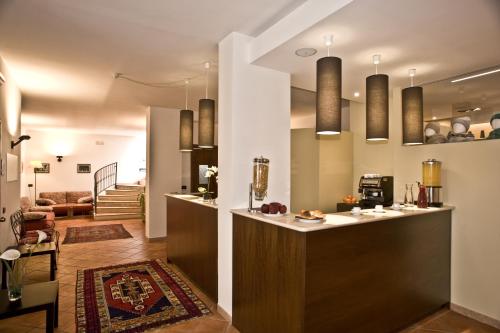 a kitchen with a counter in a room at Villa Santacroce in San Giovanni Rotondo