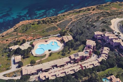 an aerial view of a resort on a hill at Porto Dona Maria Apartment in Luz