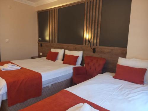 Postel nebo postele na pokoji v ubytování ADOR TROIA HOTEL