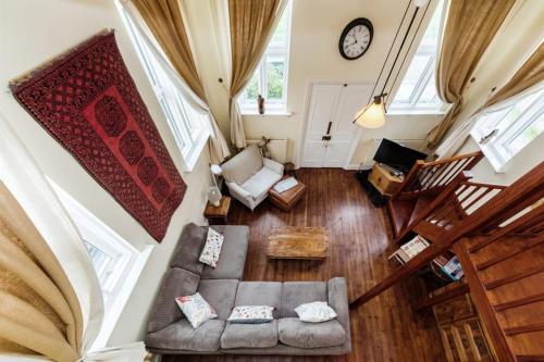 an overhead view of a living room with a couch at Chapel Cottage in Canterbury