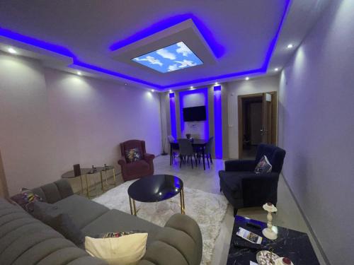 a living room with purple lights on the ceiling at Super Cozy Large Double Bedroom ONLY with Shared Facilities-Free Wifi, Netflix - Many local Shops in Esenyurt