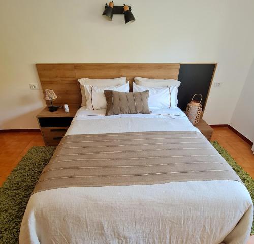 Postel nebo postele na pokoji v ubytování Chalet en Sanxenxo, encima de la playa Canelas