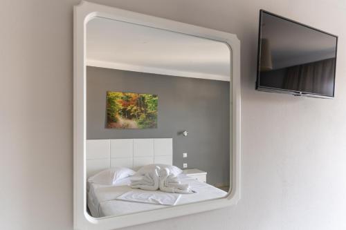 Postel nebo postele na pokoji v ubytování Atrium Hotel