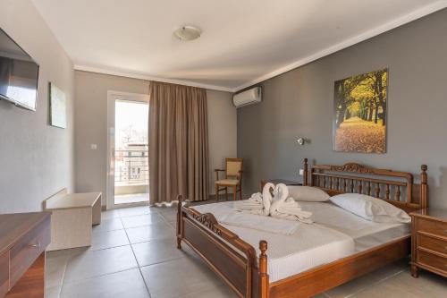 Postel nebo postele na pokoji v ubytování Atrium Hotel