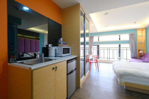 Η κουζίνα ή μικρή κουζίνα στο 85 Asia Hotel