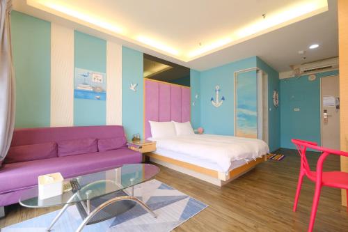 Ένα ή περισσότερα κρεβάτια σε δωμάτιο στο 85 Asia Hotel
