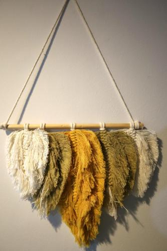 a coat rack with a bunch of fur at Marina Zeas Seaside Studio-MarinaQ in Piraeus