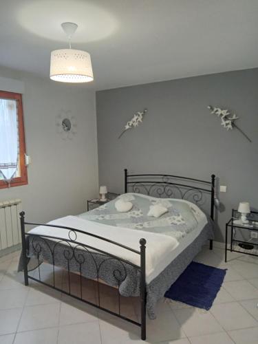 Кровать или кровати в номере La salicorne