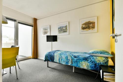 Postel nebo postele na pokoji v ubytování BEDbijPET