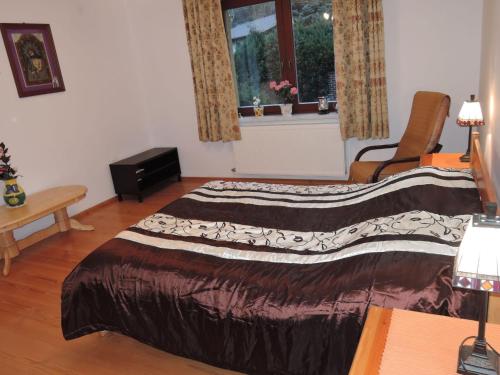 Tempat tidur dalam kamar di Big holiday home in a quiet location in Kolczewo