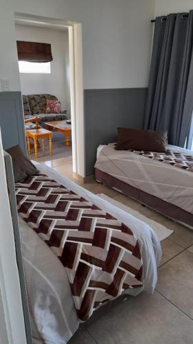 Cama o camas de una habitación en Stunning apartment with ocean views and Table Mountain