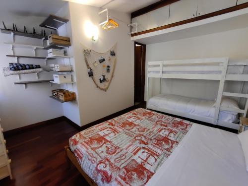 a bedroom with a bunk bed and a closet at Ca' Lucio MyTravelChioggia in Chioggia