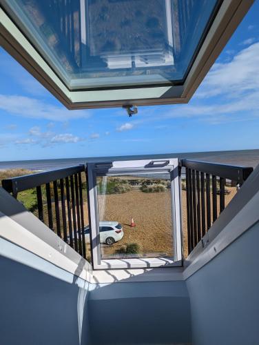 a view from the balcony of a house at Seals Bacton in Bacton