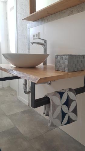 a bathroom with a sink on a counter at glüxnest in Bernstadt