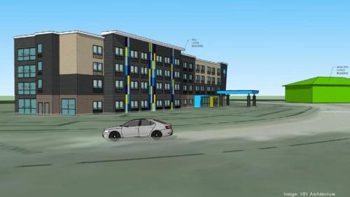 a white car parked in front of a building at Tru By Hilton Chesapeake- Greenbrier in Chesapeake