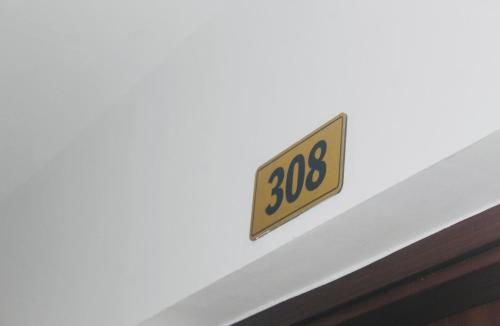 a sign that reads on a ceiling at HAPPY HOTEL Tp Rạch Giá, Kiên Giang in Ấp Rạch Mẹo