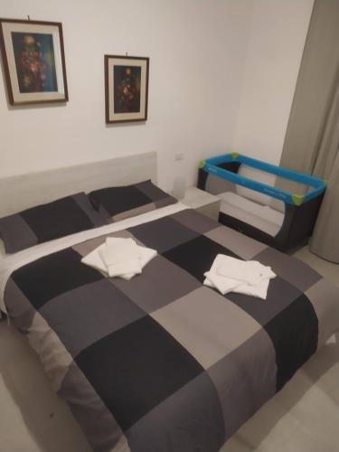 A bed or beds in a room at CASA DEGLI ANTO'