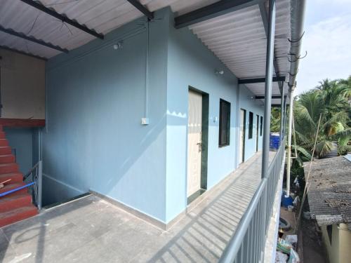 Un balcón o terraza en Shree Nivas Home stay