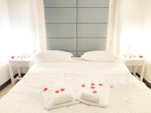 Suite In Love 21 by Zoom In Earthにあるベッド