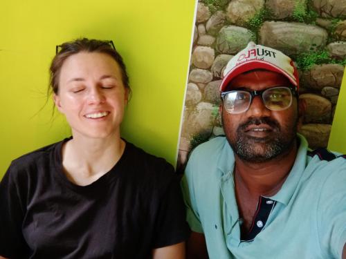 a woman and a man posing for a picture at Thendralhomestay in Puducherry