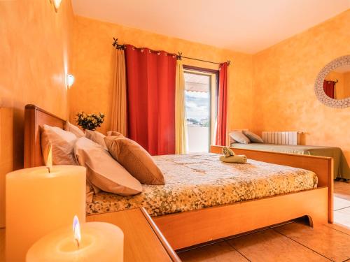 Ένα ή περισσότερα κρεβάτια σε δωμάτιο στο Sardinia Family Villas - Villa Mathilde with private pool