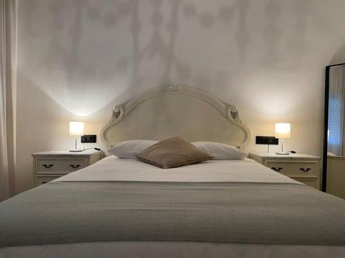 Postel nebo postele na pokoji v ubytování Penthouse in Vejer