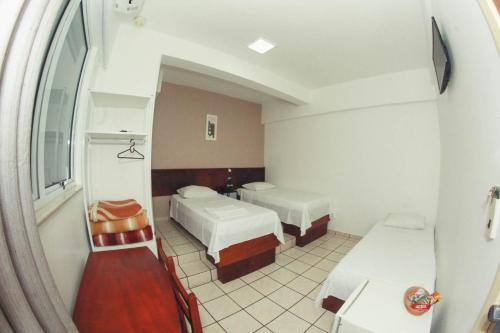 Katil atau katil-katil dalam bilik di Alpha Ville Hotel