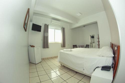 Katil atau katil-katil dalam bilik di Alpha Ville Hotel
