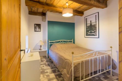Postel nebo postele na pokoji v ubytování Le 8 rue Mulet