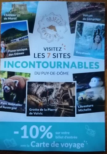a poster with pictures of animals and attractions at Iris, Gîte Saint Antoine, Orcival, entre Sancy et Volcans d'Auvergne in Orcival