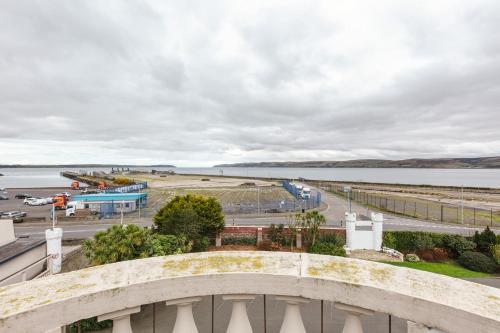 a view of a road and a body of water at North West Castle Hotel in Stranraer