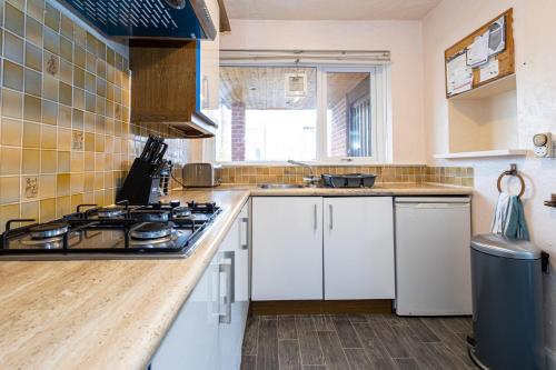 Η κουζίνα ή μικρή κουζίνα στο M9 Guest House