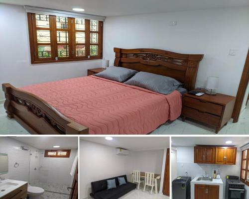 卡塔赫納的住宿－APARTAMENTOS DECOR，一间卧室配有一张床和一张书桌,另一间卧室配有一张桌子。