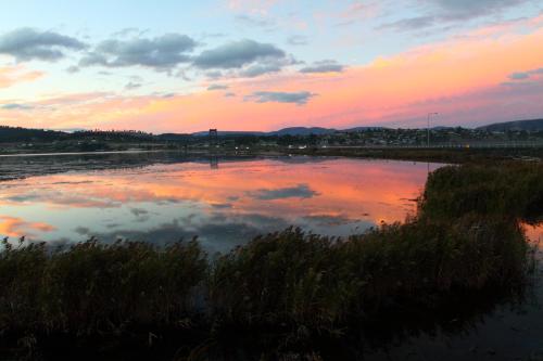 The sunrise or sunset as seen from a szállodákat or nearby