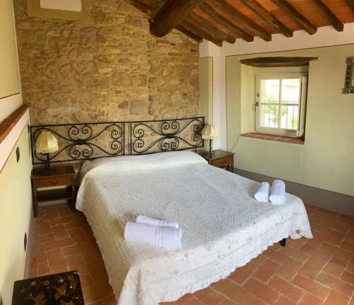 En eller flere senge i et værelse på Holidayhome Villa Torre