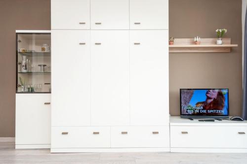 Televisyen dan/atau pusat hiburan di Haus Hanseatic, Wohnung 208