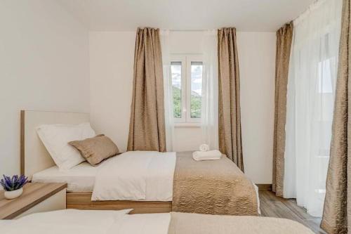 Fotografie z fotogalerie ubytování Villa Ivo v destinaci Promajna