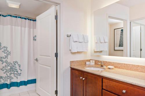 a bathroom with a sink and a shower at Residence Inn Boston Norwood in Norwood