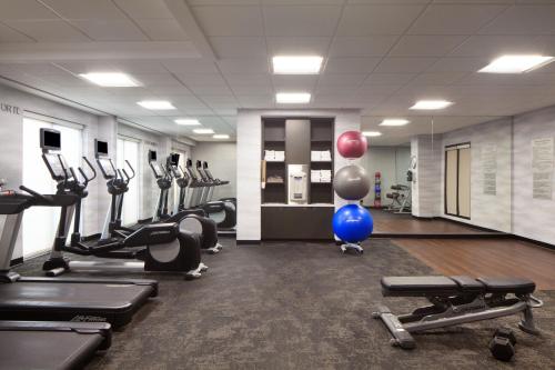 a gym with cardio equipment and balloons on the wall at Fairfield Inn & Suites by Marriott Charleston in Charleston