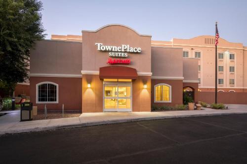 a towne place suites sign on the side of a building at TownePlace Suites by Marriott Tucson Williams Centre in Tucson