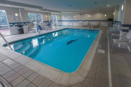 a large pool in a hotel room with a hotel at Fairfield Inn & Suites Toledo North in Toledo